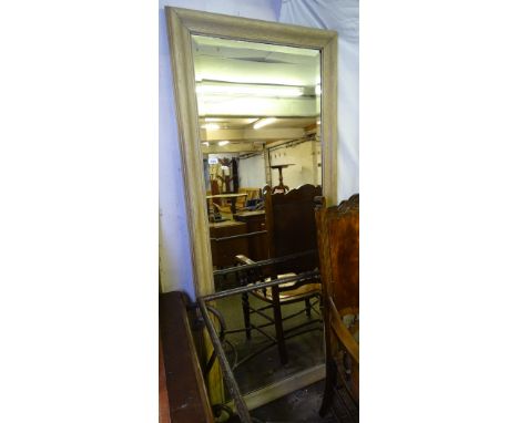 An oak framed bevel-edge wall mirror, 185cm x 75cm