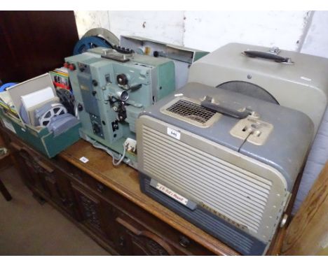 A Dixtech 16mm sound projector, a large quantity of film reels, a Bell and Howell film sound etc