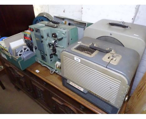 A Dixtech 16mm sound projector, a large quantity of film reels, a Bell and Howell film sound etc