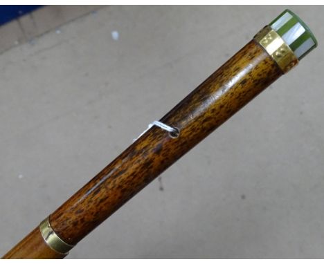 A Malacca lady's walking stick with gilt mounts