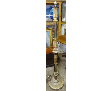 A Victorian fluted and gilded standard lamp