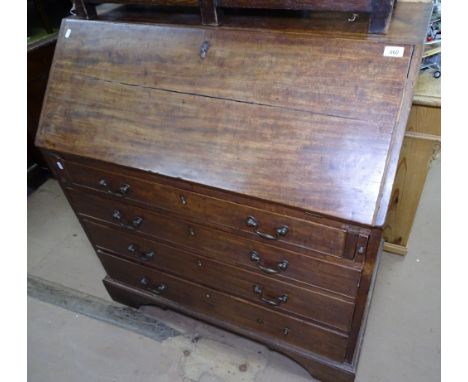 A George III mahogany bureau, with a fitted interior and 4 long graduated drawers under, bracket feet, W102cm
