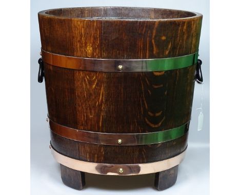 A Lister &amp; Co oak planter / waste bin with metal liner and copper bands, height 15", diameter 15"