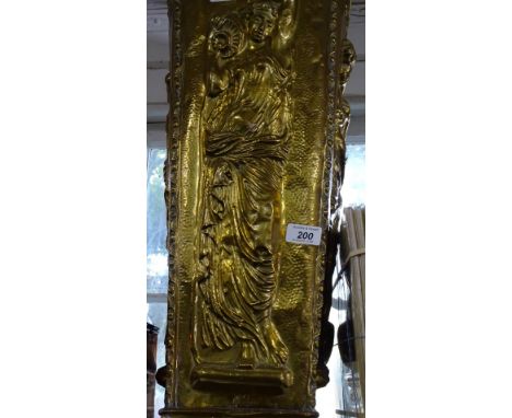 A French relief embossed brass stick stand, height 25"