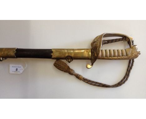 A Royal Navy Officer's dress sword, cast-brass bowl hilt with shagreen grips, original brass-mounted leather scabbard inscrib