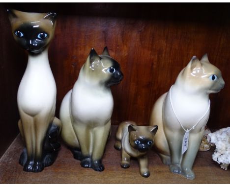 Sea shells, Siamese cats, a stick stand etc