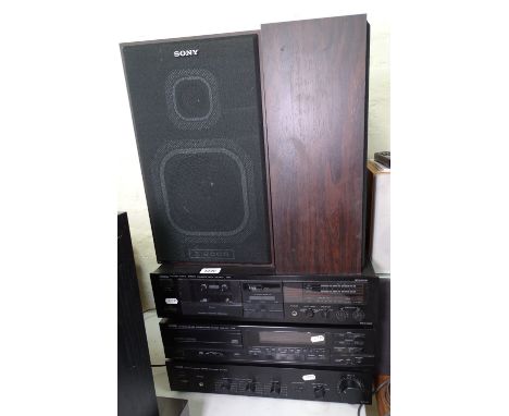 A Yamaha KX-200 cassette deck, a Yamaha CDX-710 compact disc player, a Yamaha AX-300 amplifier, and a pair of speakers, GWO