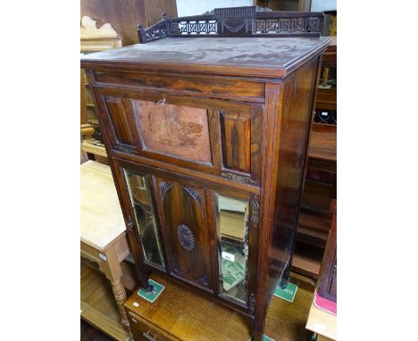 An Edwardian rosewood music cabinet, with mirrored panel door, W 57cm