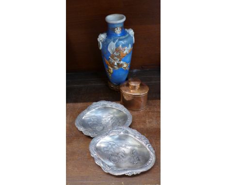 A pair of Chinese pewter dishes with scenes, a copper tea caddy and a Chinese blue vase