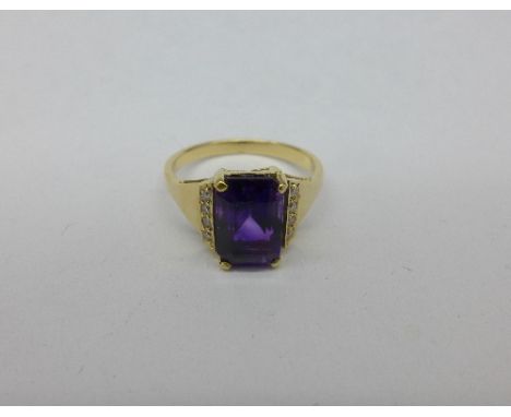 An 18ct gold set, amethyst and diamond ring, 3.5g, N