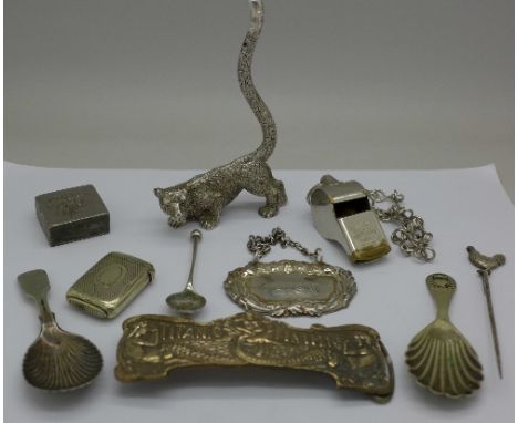 A whistle, vesta case, caddy spoon, etc.