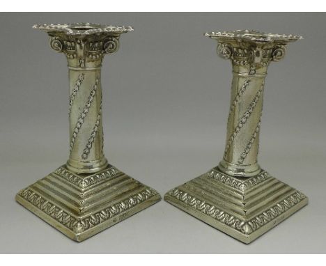 A pair of silver candlesticks, London 1900 and Sheffield 1901, by William Hutton