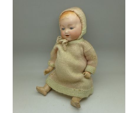 A bisque head doll, marked AM Germany, 352/12½K, 31cm