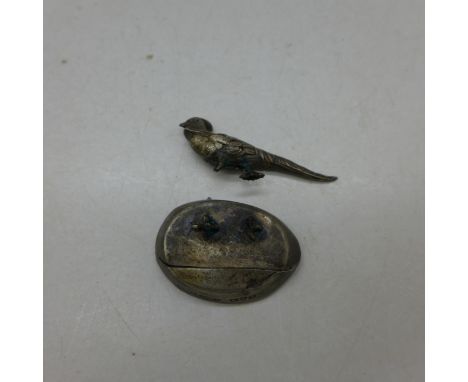 A silver pheasant finial, a/f, Mordan & Co.