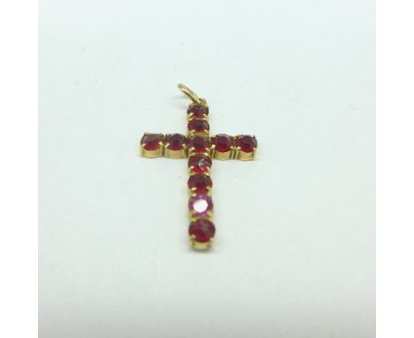 A yellow metal and ruby cross pendant, 1.1g