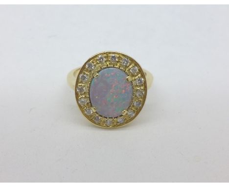 An 18ct gold, diamond and opal ring, 5.4g, N