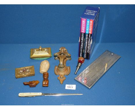 A small quantity of miscellanea to include door knocker, carved stone bird, brass rocking blotter, Cribbage board etc.