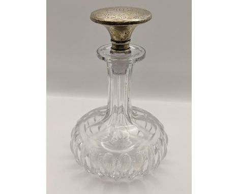 A sterling silver topped squat formed decanter, to stopper engraved with initials and a floral design, 17.5cm hLocation: 