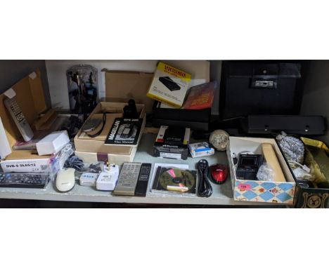A mixed lot of computer, gaming and other electrical accessories to include a Magellan GPS 300 with user manual, a digital re