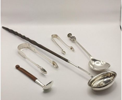 Silver to include 2 sugar tongs, a seal spoon 130g, a toddy ladle and a Scandinavian spoon. 