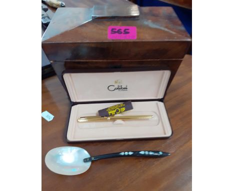 A sarcophagus tea caddy A/F, a Colibri gold tone pen and a mother of pearl spoon. Location:RAF 
