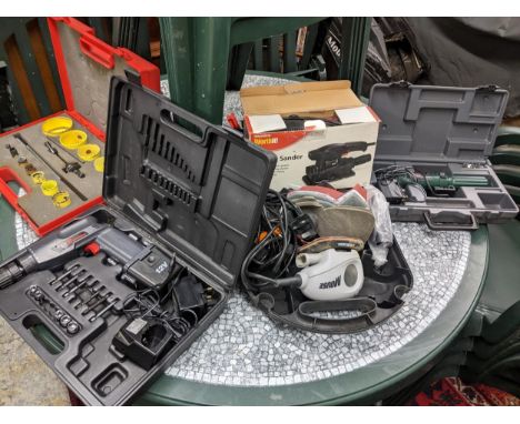 Mixed power tools to include a Performance Power 12v cordless drill, an Orbital sander and Black &amp; Decker items. Location