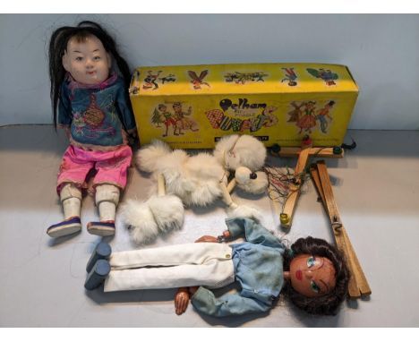 Three dolls to include a boxed Pelham puppet of a poodle Location: 