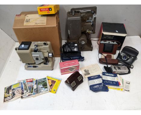 Photographic equipment to include projectors, Polaroid and others along with a View Master and reelsLocation: 