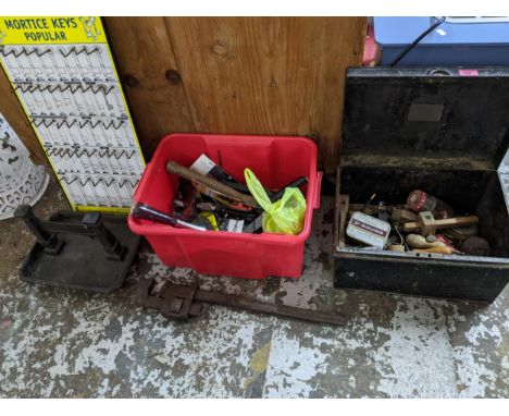 A mixed lot of tools and other items to include a cast iron foot scraper, a mortice key wall hanging holder, a Record pipe wr