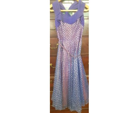 A mixed lot comprising a 1940's sleeveless bespoke purple cocktail dress with silver thread detail to the netted outer layer 