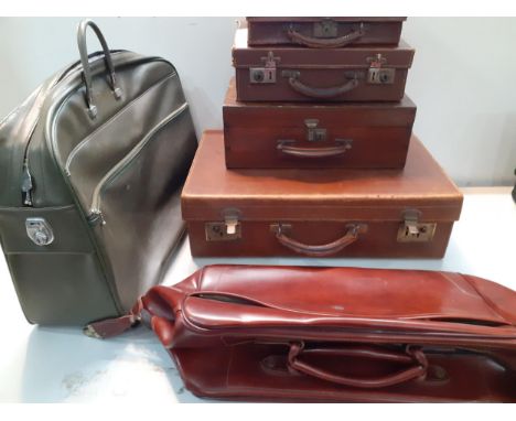 Three vintage leather suitcases; one by W.M Ives, Lincoln, 55cm x 34cm, one by Arnolds Ltd 30cm x 18cm and one 34cm x 25cm to
