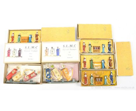 Dinky 49 Petrol Pump Sets a group of 4 each containing Oil Bin and 4 x Petrol Pumps - conditions are generally Fair to Good P