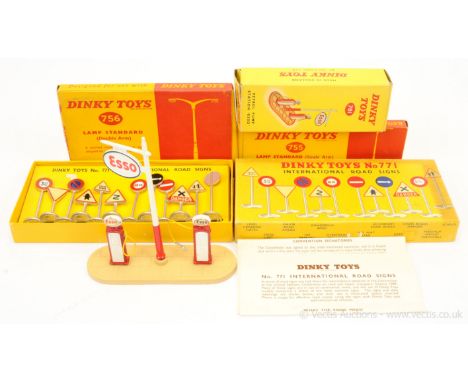 Dinky Accessory group to include 781 "Esso" Petrol Pump Set; 771 "International Road Signs" Set of 12; 756 Lamp Standard (dou