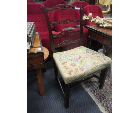 A George III mahogany ladder back dining chair with needlepoint seat  