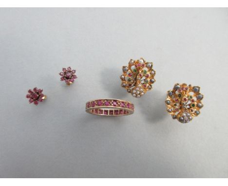 A pair of gemset peacock earstuds together with a ruby full hoop eternity ring and a pair of red hardstone cluster earstuds, 