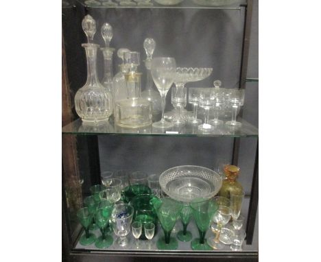 A quantity of glassware to include comports, green coloured glass rinsers, lamp base etc  