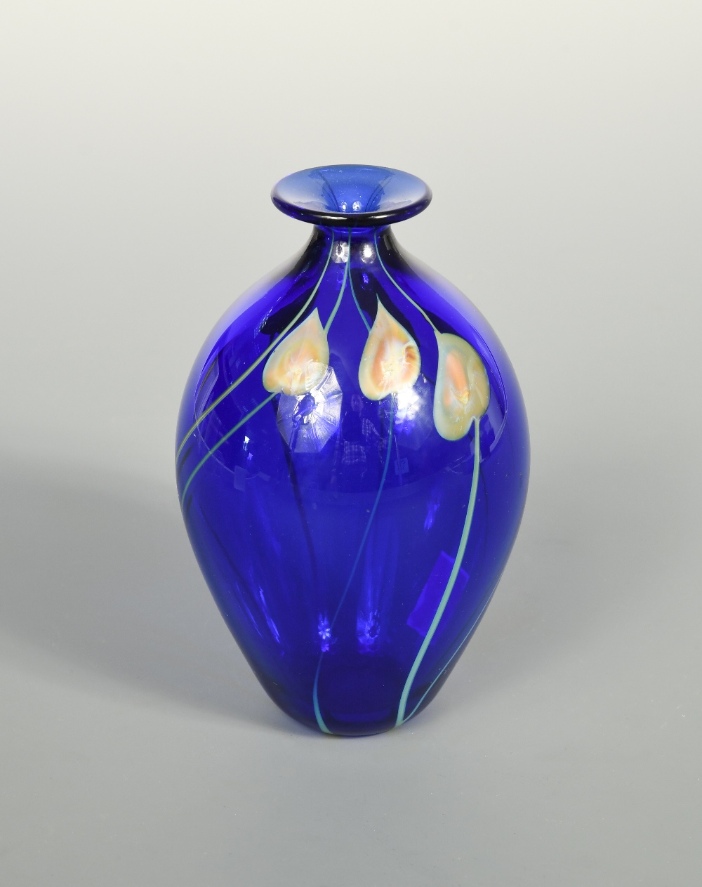 A Rochester Folk Art Guild glass vase, 1981, the bulbous blue glass ...