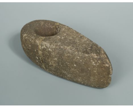 A Neolithic stone axe head  