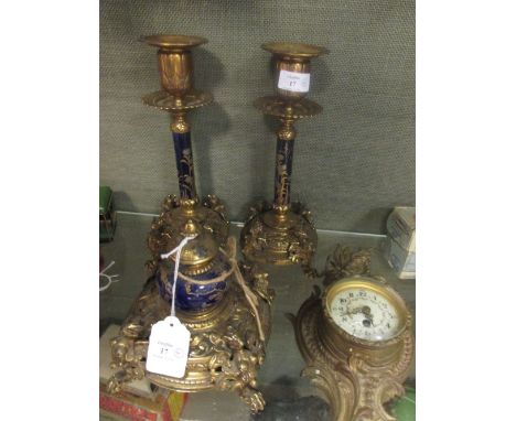 A late Victorian brass and ceramic japanesque style desk set to include a pair of candlesticks, inkwell and an Edwardian bras