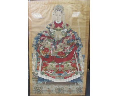 A Chinese ancestral portrait, seated wearing an elaborate robe in a chair draped with a tiger skin, 120 x 64cm  