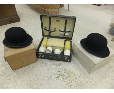 Two bowler hats by Locke & Co., in cardboard boxes, together with a Brexton's picnic hamper with fitted interior (3)