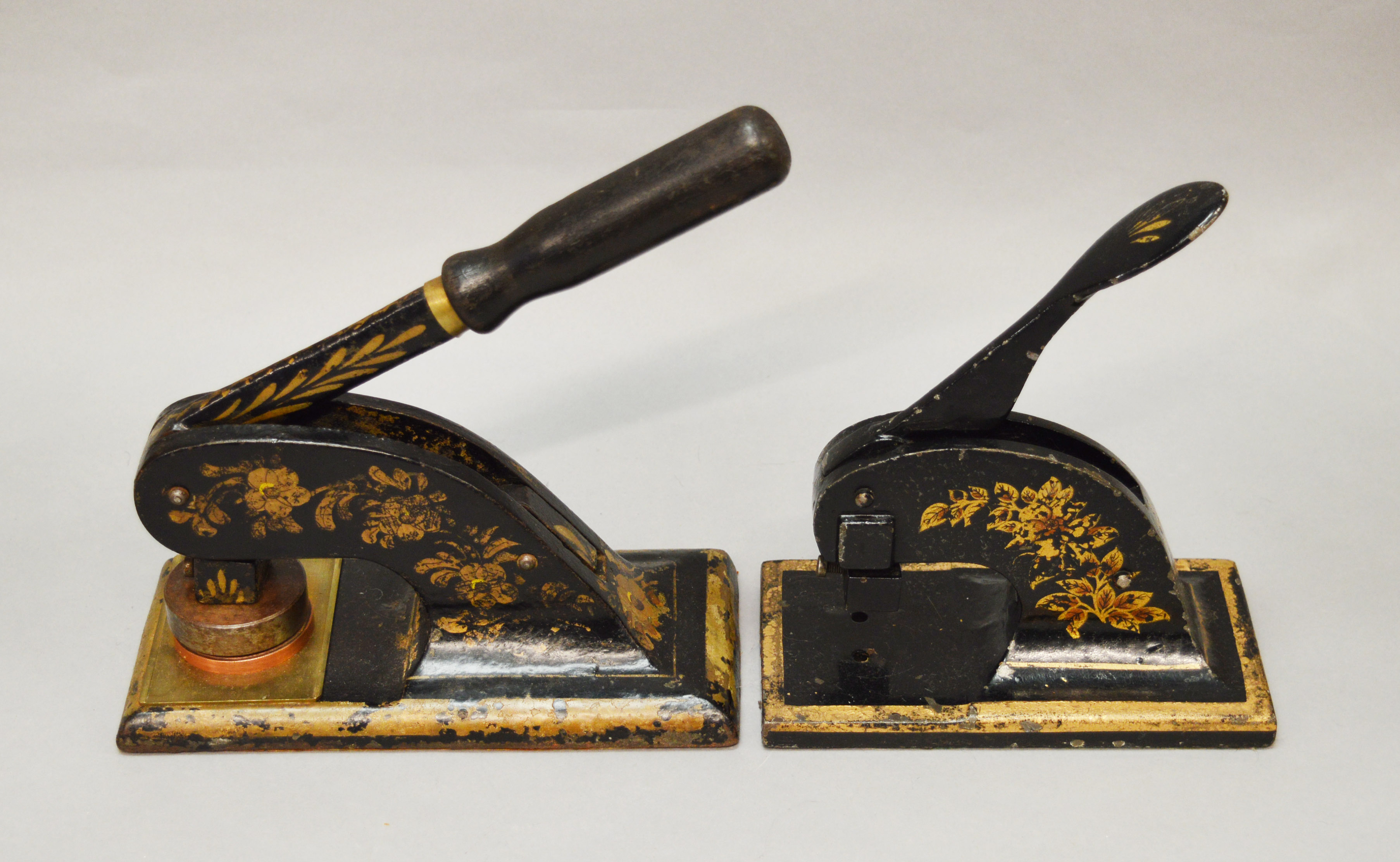 2 Victorian hand letter presses with black lacquer and gilded designs.