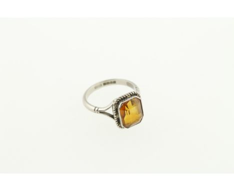 An 18ct H/M white gold citrine set ring, size M, approx 4.4gms