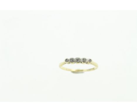 A five stone diamond ring stamped 18ct, one small diamond chipped, approx 2gms