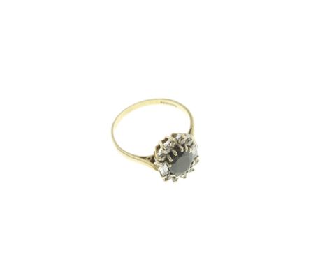 A 9ct H/M dress ring with synthetic stones, size T, approx 3.3gms