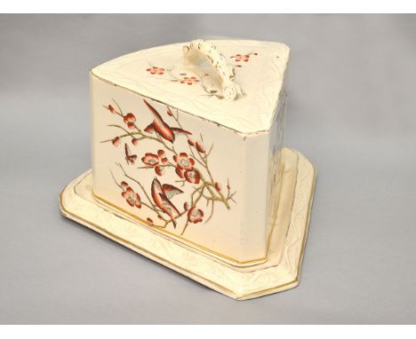 A late 19th Century ceramic cheese dish with bird design. Height 20cm approx. 