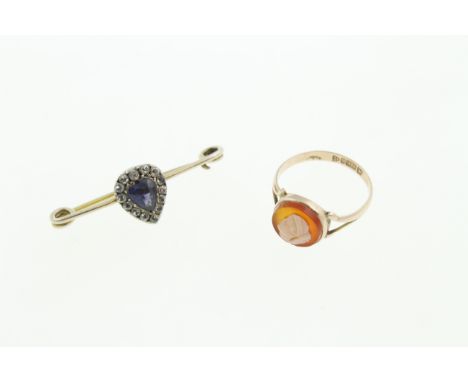 A 9ct cameo ring H/M Chester 1913, sizde M, together with a Victorian brooch unmarked tested as 9ct set with synthetic stones