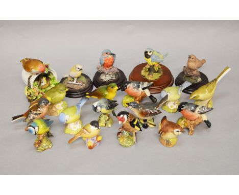 A collection of ceramic and resin bird figures including Beswick, Aynsley, Royal Adderley etc. (18)