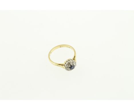An 18ct H/M sapphire &amp; diamond cluster ring, size N, approx gross weight 3.7gms