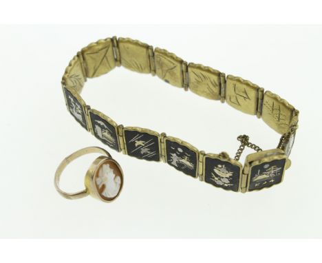 A gilt metal Victorian cameo ring together with a Japanese gilt metal bracelet depicting Mount Fuji, etc